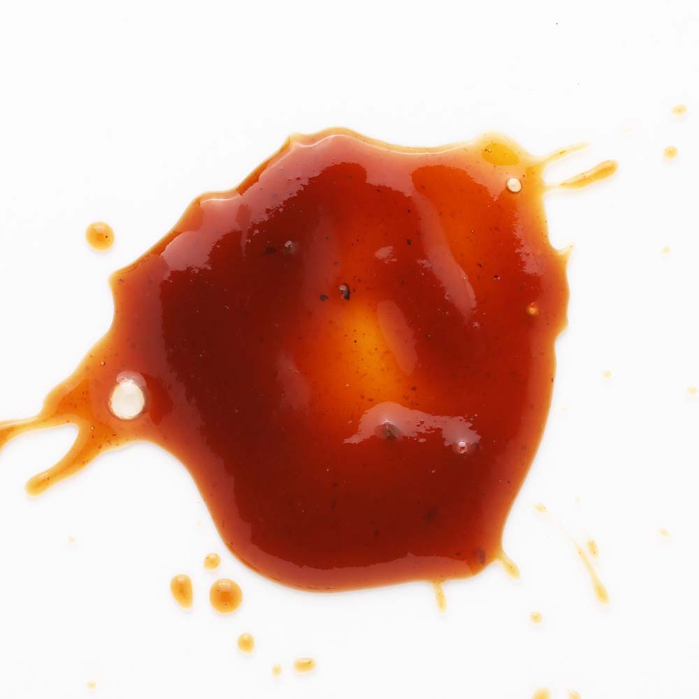 TDs Brew and BBQ The Original BBQ Sauce splatter on white background